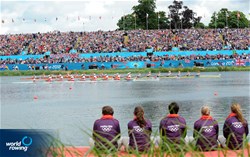 Volunteers and 30,000 fans watch the final of the women's eight at the 2012 Olympic Rowing Regatta at Eton-Dorney near London, Great Britain.