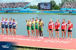Podium of the lightweight men's four: Silver medallists Peter Chambers (l), Rob Williams, Richard Chambers and Chris Bartley (r) of Great Britain, Gold medallists James Thompson (l), Matthew Brittain, John Smith and Sizwe Ndlovu (r) of South Africa and Bronze medallists Kasper Winther (l), Morten Jorgensen, Jacob Barsoe and Eskild Ebbesen (r) of Denmark listen to the national anthem of South Africa at the 2012 Olympic Rowing Regatta at Eton-Dorney near London, Great Britain.