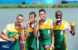 James Thompson (b), Matthew Brittain, John Smith and Sizwe Ndlovu (s) of South Africa celebrate winning Olympic gold in the lightweight men's four at the 2012 Olympic Rowing Regatta at Eton-Dorney near London, Great Britain.