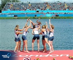 Erin Cafaro, Zsuzsanna Francia, Esther Logren, Taylor Ritzel, Meghan Musnicki, Eleanor Logan, Caoline Lind, Caryn Davies throw cox Mary Whipple, of the United States of America, in to the water to celebrate winning Olympic gold in the women's eight at the 2012 Olympic Rowing Regatta at Eton-Dorney near London, Great Britain.