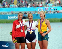 Fie Udby Erichsen of Denmark, Mirka Knapkova of Czech Republic and Kim Crow of Australia celebrate winning medals in the women's single sculls at the 2012 Olympic Rowing Regatta at Eton-Dorney near London, Great Britain.