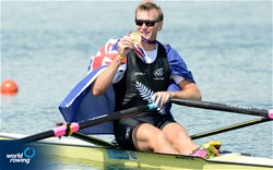 Mahe Drysdale of New Zealand celebrates winning gold in the men's single sculls at the 2012 Olympic Rowing Regatta at Eton-Dorney near London, Great Britain.