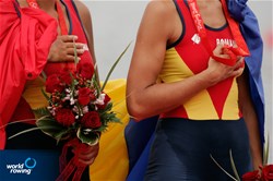 Georgeta Andrunache-Damian and Viorica Susanu from Romania during their national anthem after winning old in the Women's Pairs at the 2008 Olympic games in Beijing, China.