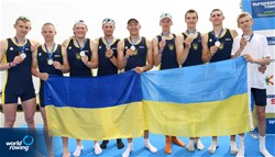 Kyrylo Furs (b), Vladyslav Khrushch, Roman Rudenko, Roman Pokryshka, Yevhen Sotnikov, Pavlo Bolotov, Mykyta Oliinyk, Mark Haidar (s), Pavlo Subit (c), Men's Eight, Ukraine, Silver, 2022 European Rowing Under 19 Championships, Varese, Italy / Detlev Seyb/MyRowingPhoto.com