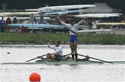 The Slovenian men's double sculls with Luka Spik (b) and Iztok Cop (s) celebrating their victory in the Final A at the 2007 World Rowing Championships in Munich, Germany.