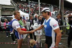 Jueri Jaanson (R) from Estonia congratulates Adrien Hardy from France before the victory ceremony of the 2007 World Rowing Championships in Munich, Germany.