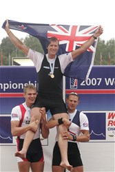 Podium of the men's single sculls: Ondrej Synek (L) from the Czech Republic and Olaf Tufte from Norway lifting the winner Mahe Drysdale from New Zealand.