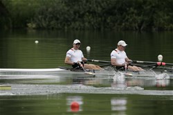 The German Men's Double Sculls with Eric Knittel (b) and Stephan Krueger (s) on their way to victory at the 2009 Rowing World Cup in Lucerne, Switzerland. 
