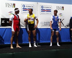 Xeno Mueller of Switzerland, Olaf Tufte of Norway, and Matthew Wells of Great Britain on the medal podium for the mens single sculls at the 2001 Rowing World Cup in Princeton, United States of America