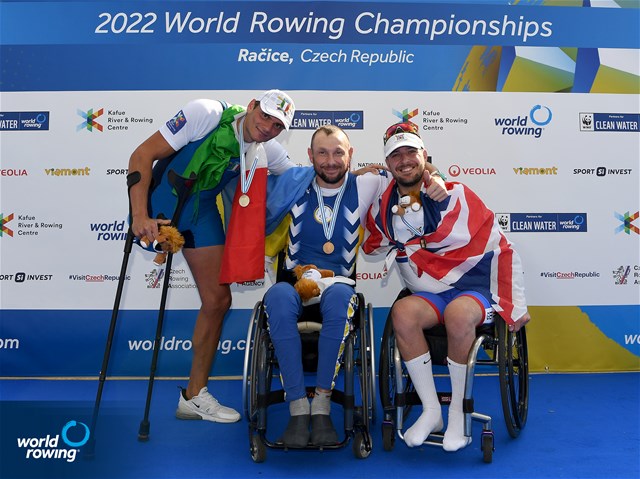 Roman Polianskyi, PR1 Mens Single Sculls, Ukraine, Gold, Giacomo Perini, Italy, Silver, Benjamin Pritchard, Great Britain, Bronze, 2022 World Rowing Championships, Racice, Czech Republic / Detlev Seyb/MyRowingPhoto.com